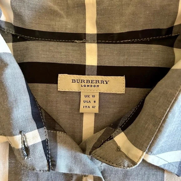Burberry Black and White Checkered Blouse
Great preloved condition. Size 8. - Picture 3 of 3